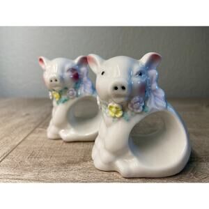 A Pair of Vintage Ceramic Pigs Flowers with Lavender Bow Napkin Rings